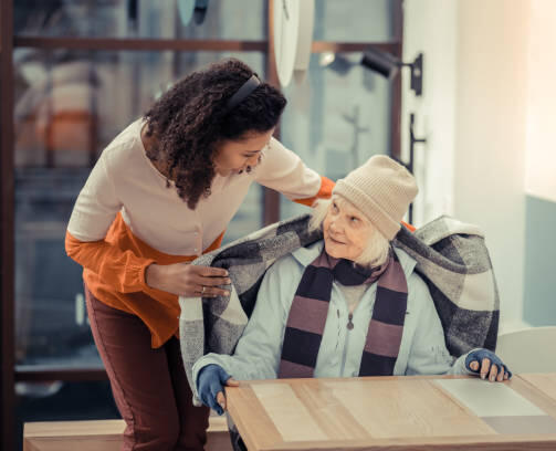 Volunteer Helping the Elderly